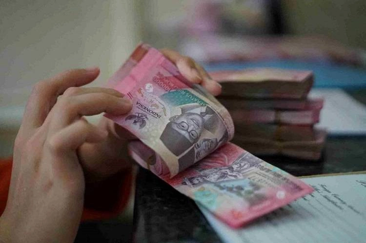 Rupiah Diprediksi Melemah, Analis Perkirakan Tembus Rp18.010 per USD